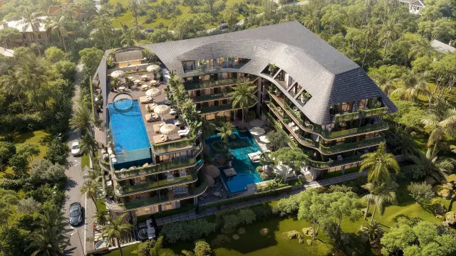 Amani Melasti — аерофото-рендер готелю зверху: басейни, тераси, тропічний сад