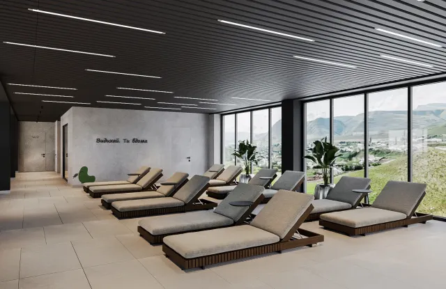 Зона відпочинку SPA WOL.GREEN Polyana з лежаками та видом на Карпати